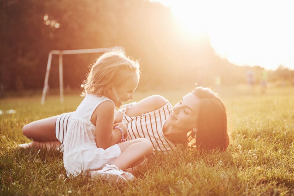 Mother and daughter in park